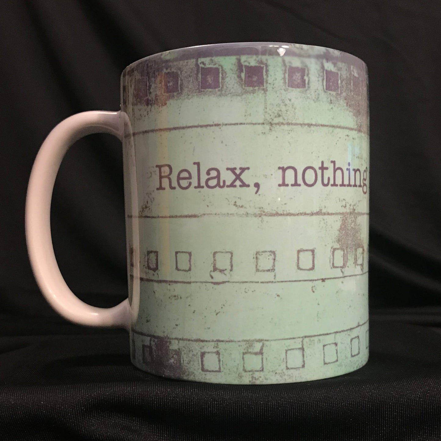 Pastel colors on a mug. Text reads "Relax, nothing is under control."