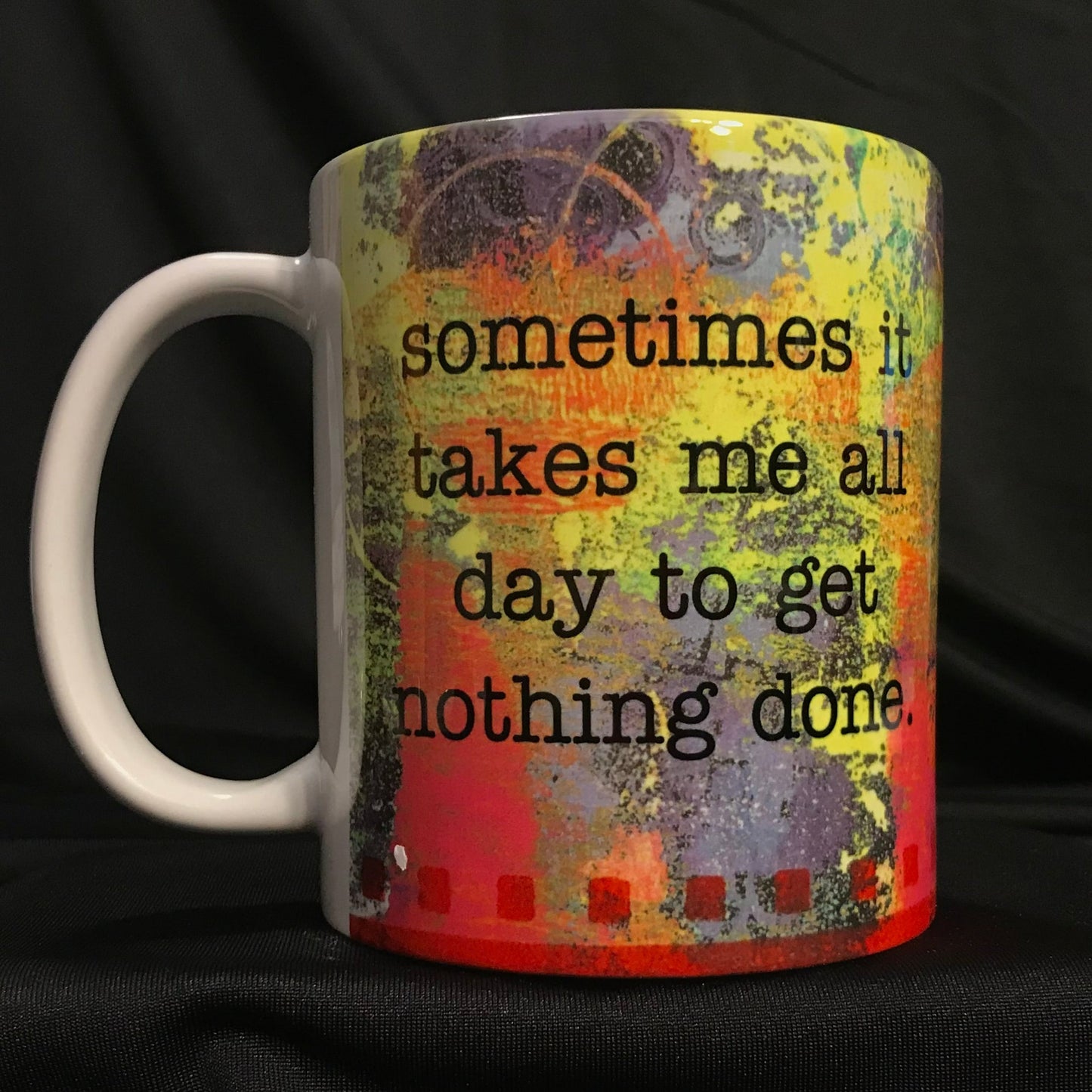 Mug text says "Sometimes it takes me all day to get nothing done." 